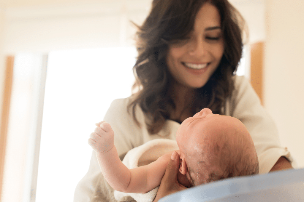 massaggio neonatale shantala