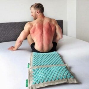 Immagine di un tappetino Mysa con informazioni sui benefici e le controindicazioni del massaggio di agopressione